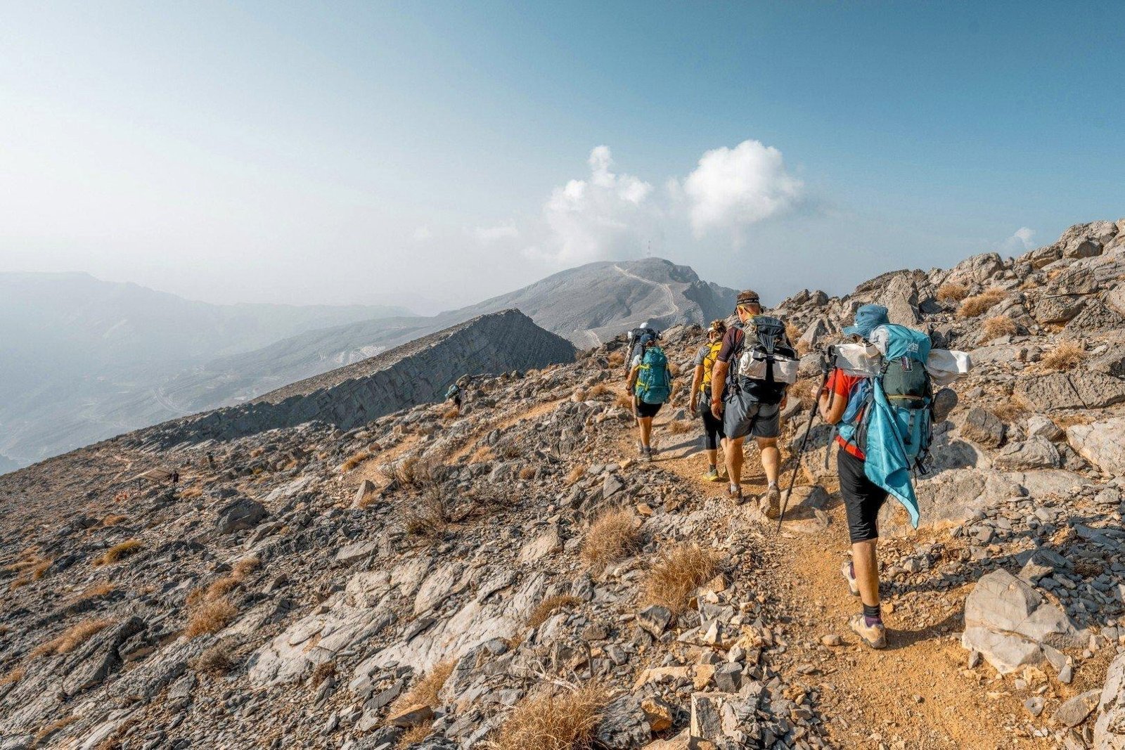 Hiker wearing a hiking daypack on a UAE mountain trail