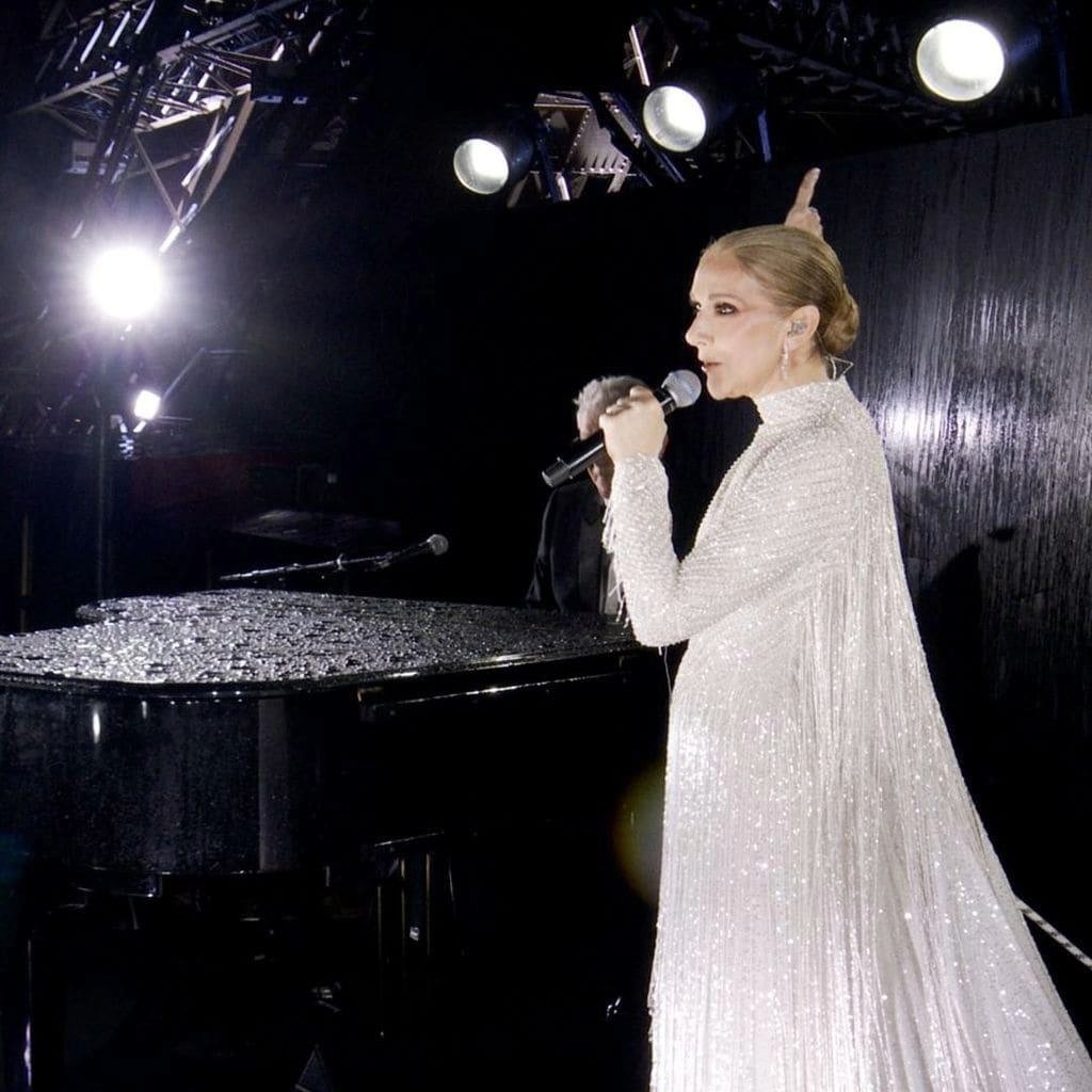 Céline Dion performs during the Paris 2024 Olympics opening ceremony ahead of her 2026 Paris concert return